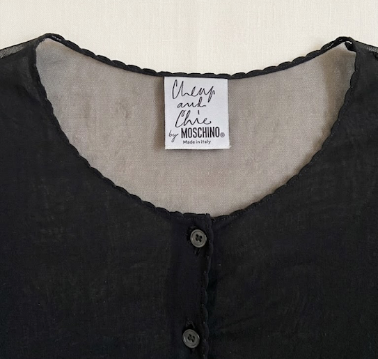 Vintage Moschino Cheap and Chic black sheer mesh cardigan from the 1990s / early 2000s era