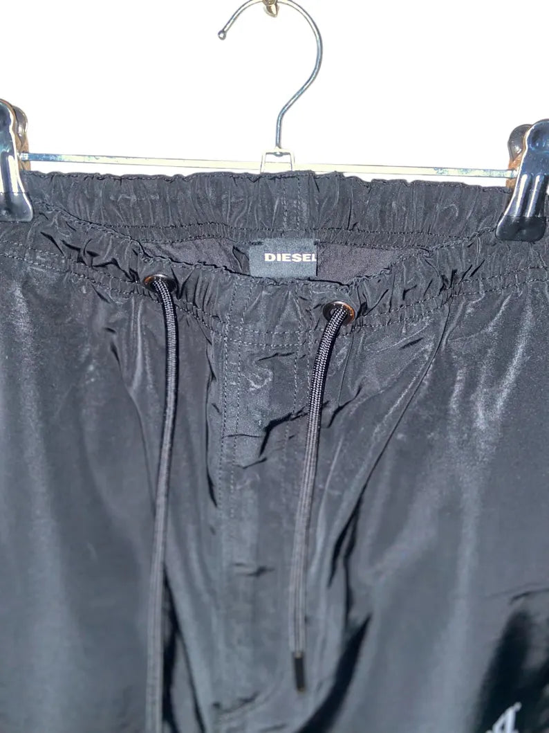 Diesel Black Technical Track Pants, Nylon Joggers Streetwear, Adjustable Cargo Utility Trousers, Premium Urban Tracksuit Bottoms, Size S